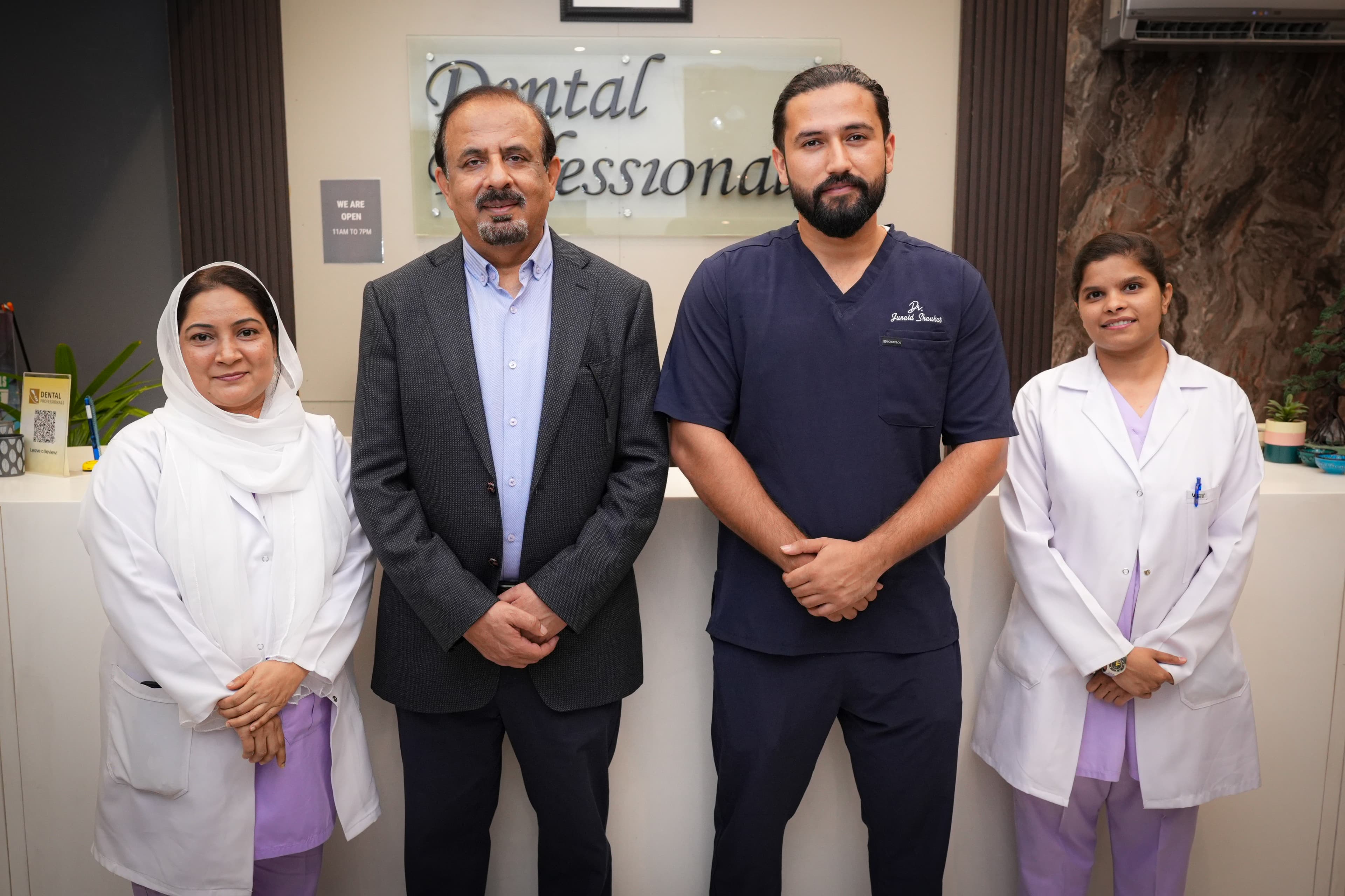 Dr. Amjed Ali Khan with their team